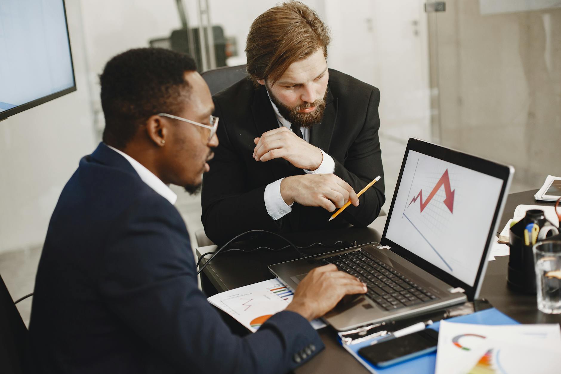 men in suit having a meeting